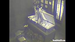 Kinky brunette was caught sucking a rock hard dick and having sex in the coffin