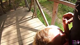 Sweet blonde girl is sucking her neighbor's dick on the porch, in the late afternoon