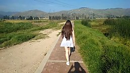Whore with powerful legs shows off her ass and pussy and sucks a dick outdoors