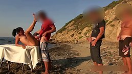 Slutty German brunette is getting fucked from the back on the beach, during the day