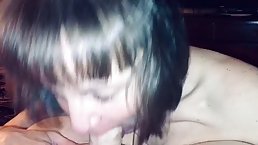 Cock loving granny is giving a blowjob to a horny neighbor, while kneeling in front of him