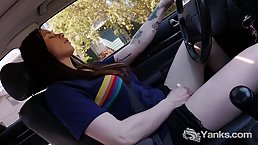 Matilda is masturbating and trying to drive a car, in the middle of the day