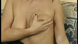 Naughty German blonde is about to have casual sex with a handsome stranger, on the couch