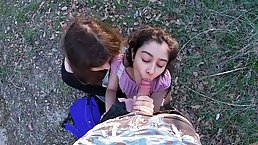 Two slutty girls are having fun with a rock hard dick while no one is watching