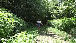 Amateur woman is masturbating in the nature, during the day and moaning from pleasure while cumming