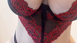 Chubby brunette with big boobs is about to masturbate with a dildo, in front of the camera