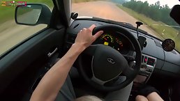 Naughty blonde girl is giving a blowjob to a stranger while he is drivng her home