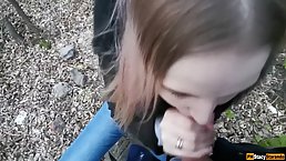 Slutty, amateur girl is sucking her step- brother's dick in the nature, to make him cum