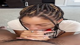 Naive Ebony babe is eagerly sucking a big, black cock while kneeling on the floor