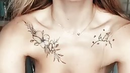 Slutty amateur babe with saggy tits and tattoos is rubbing and fingering her wet pussy