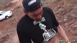 Lovely African babe with curly hair is sucking a rock hard dick in the nature
