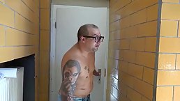 Melina May is spreading her legs wide open through a gloryhole and getting fingered and fucked