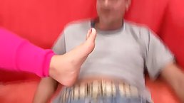 Seductive blonde is having sex on the couch, after giving a footjob to her lover