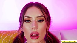 Pigtailed brunette with huge boobs is using a big, fake dick to make herself cum