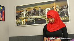 Babe in a red niqab is sucking a rock hard dick and getting fucked hard