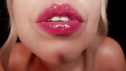 Lovely blonde is doing naughty stuff with her sensual lips, in front of the camera
