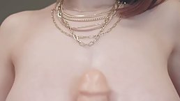 Red haired cock teaser is sucking her favorite, big dildo in front of the camera
