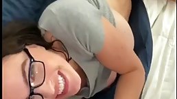 Busty brunette with a nicely trimmed pussy is getting fucked in front of the camera