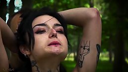Small titted brunette with pierced nipples got tied up and fucked in the forest, the other day