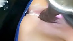 Insatiable white babe is riding a big, black dildo on cam and moaning while cumming