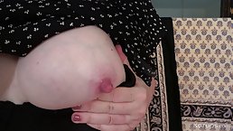 Red haired mature with big boobs is about to get naked and start masturbating, until she cums