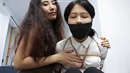 Sexy Japanese lesbian boundage and nylone fetish session