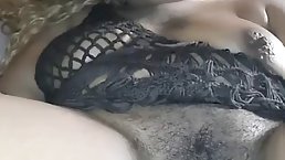 Amateur ebony babe masturbates with black dildo