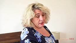 50 y.o. granny Camilla Creampie masturbates on the bed