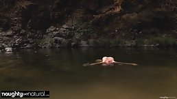 Mature MILF swimming in the forest lake