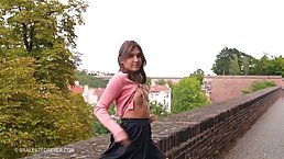 Sexy brunette babe Ellie flashes her tits and pussy in public places