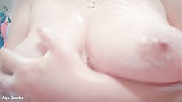 Naked natural boobs teasing in the bathroom