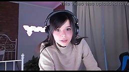 Young tattooed brunette girl masturbates her pussy