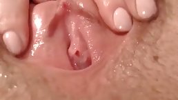 Young brunette babe masturbates her hairy pussy