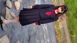 Sexy Japanese schoolgirl gets her shaved pussy fingered and fucked