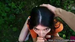 A cock hungry girl blowjobs on a walk in the forest (POV)