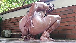 Hot ebony babe masturbates with big dildo and a soap on cam