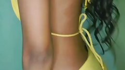Young Indian student girl plays with vibrator