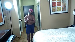 Black slut with anal plug in her ass sucks big black cock