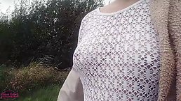 Amateur girl walking in fishnet top with no bra