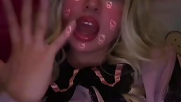Young blonde girl wishes you a Happy Halloween