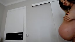 Nine mounth pregnant beauty is home alone