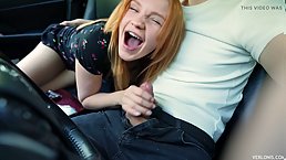 Young redhead babe sucks dick and gives pussy in the car (POV)