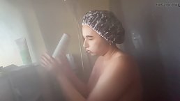 Amateur busty brunette girl taking hot shower