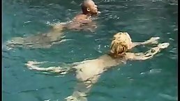 Two hot babes share BBC near the waterfall