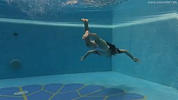 Skinny Russian babe Irina Russaka swimming nude
