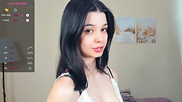 Pretty brunette girl posing for a cam