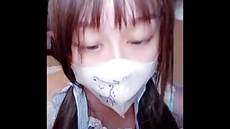 Busty Chineese girl masturbates with vibrator on web cam