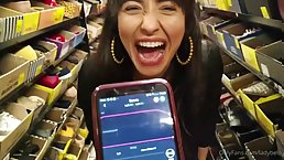 Two pretty girls having fun in the shop