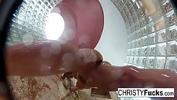 Sexy brunette pornstar Christy gets fucked in the shower