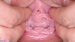 Brunette MILF with glasses Emylia Argan opens her pussy
